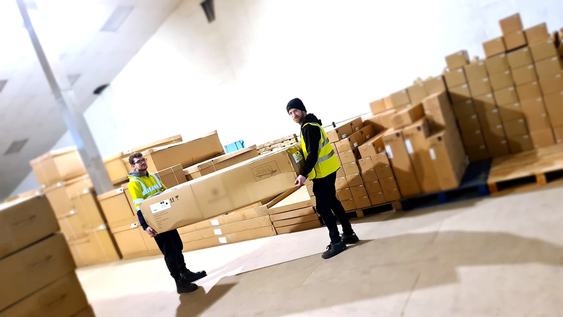 Large boxed goods being handled in a warehouse